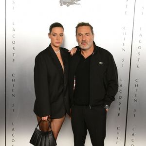 Adèle Exarchopoulos et Gilles Lellouche au photocall de la soirée Lacoste X Chien 51 au club Silencio en marge du 78ème Festival International du Film de Cannes, France, le 18 mai 2025. © Romain Doucelin/Bestimage