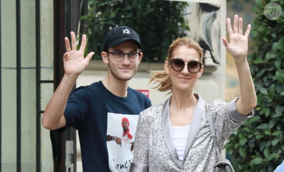 Céline Dion et son fils René-Charles (avec une nouvelle coupe de cheveux) quittent l'hôtel Royal Monceau et se rendent chez Louis Vuitton sur les Champs-Elysées à Paris le 19 juillet 2017. (Agence / Bestimage).