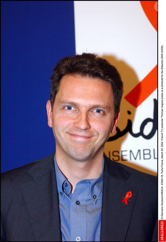 © Giancarlo Gorassini/ABACA. 57624-18. Paris-France, 24 mars 2004. Le présentateur de télévision français Thomas Hugues pose lors d'un photocall pour le Sidaction 2004 (SIDA).