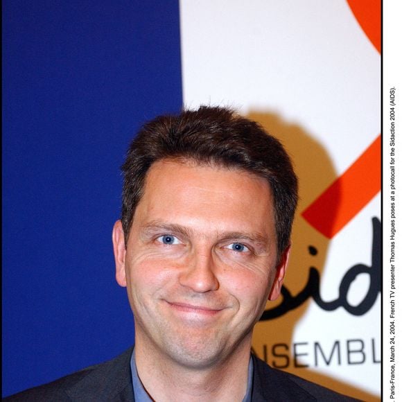 © Giancarlo Gorassini/ABACA. 57624-18. Paris-France, 24 mars 2004. Le présentateur de télévision français Thomas Hugues pose lors d'un photocall pour le Sidaction 2004 (SIDA).