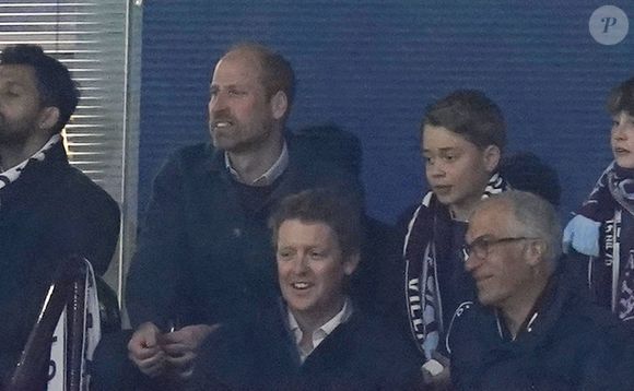 Le prince William, prince de Galles, et le prince George de Galles, dans les tribunes du match de quart de finale retour de Ligue Des Champions 2024-2025 (LDC) "Aston Villa - PSG (3-2)" au stade Villa Park. Imago/PsnewZ/Bestimage