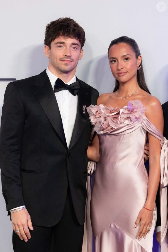 Charles Leclerc et son épouse Alexandra Saint Mleux assistent à la 70ème édition du Bal de la Rose au Sporting Club de Monte-Carlo à Monaco, le 21 mars 2026.  © Olivier Huitel/Pool Monaco/Bestimage