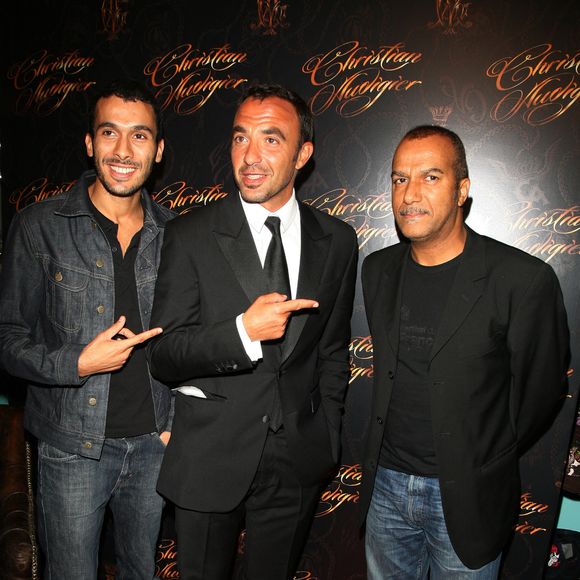 Nikos Aliagas et Pascal Légitimus assistent à l'ouverture de la boutique Christian Audigier à Paris, France, le 3 septembre 2009. Photo Denis Guignebourg/ABACAPRESS.COM