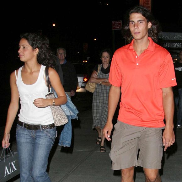 Rafael et Xisca sont ensemble depuis vingt ans.
Le champion de tennis espagnol Rafael Nadal et sa petite amie Xisca quittent leur hôtel de Midtown Manhattan pour une soirée shopping à New York City, NY, USA le 26 août 2006. Nadal participera à l'US Open 2006. Photo Ramey Agency/ABACAPRESS.COM