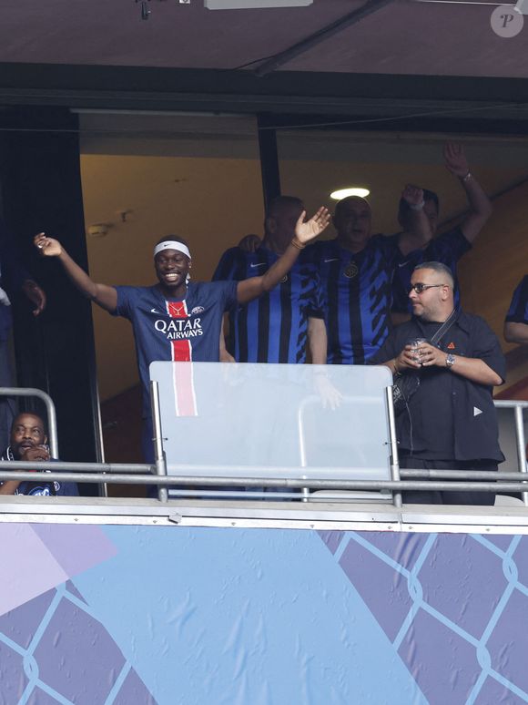 Tiakola - Les célébrités dans les tribunes de la finale de la Ligue Des Champions 2025 "PSG - Inter Milan (5-0)" à l'Allianz Arena de Munich, le 31 mai 2025.
© Cyril Moreau/Bestimage