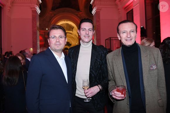 Benoit Lo Schiavo, Rodolphe Moulin-Chabrot , directeur de la communication et des relations extérieures de Moët Hennessy, François-Xavier Desplancke, président de Moët Hennessy spiritueux - Soirée de lancement de l’édition française du magazine Time au Petit Palais à Paris le 15 décembre 2025. © Rachid Bellak / Bestimage