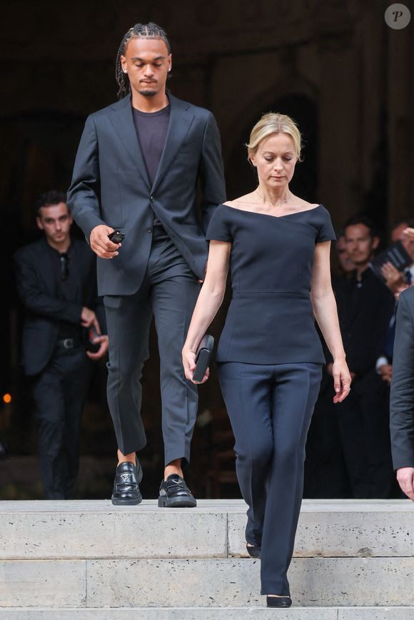 Audrey Crespo-Mara et son fils Sékou à la Sorties des obsèques de Thierry Ardisson en l'église Saint-Roch de Paris, France, le 17 juillet 2025. © Clovis-Jacovides/Bestimage