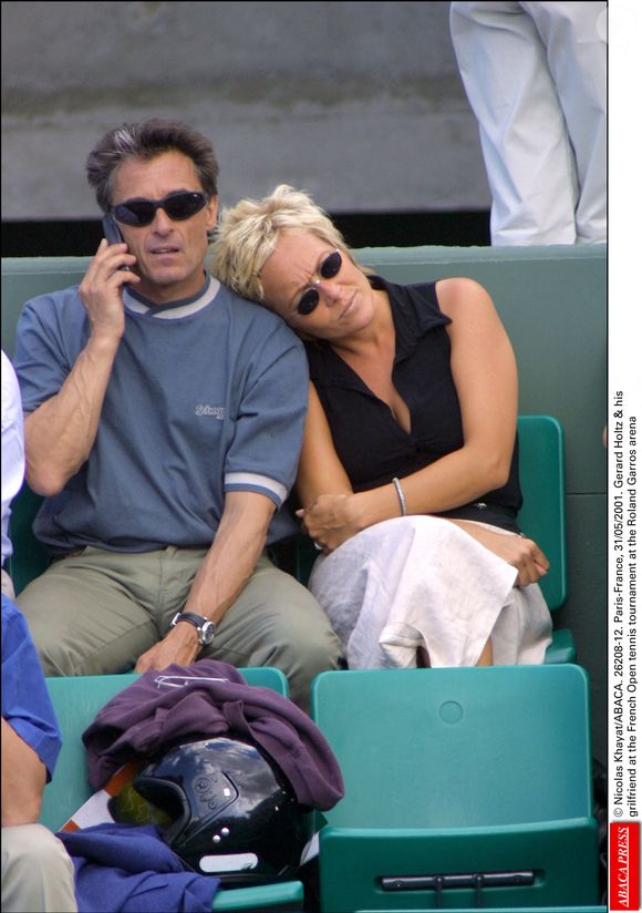 Gérard Holtz et sa compagne au tournoi de tennis de Roland Garros. 31 mai 2001. © Nicolas Khayat/ABACA