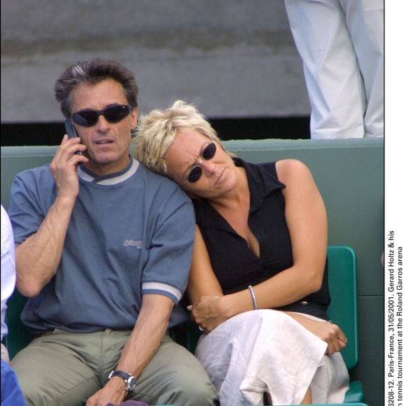 Gérard Holtz et sa compagne au tournoi de tennis de Roland Garros. 31 mai 2001. © Nicolas Khayat/ABACA