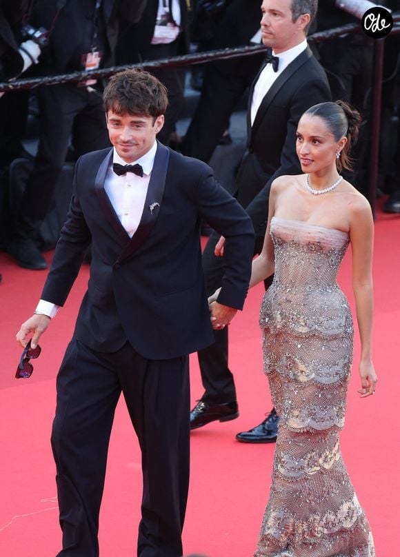Depuis l'officialisation de leur histoire en 2023, Alexandra Leclerc et Charles Leclerc forment l'un des couples les plus suivis du paddock.

Charles Leclerc et sa femme Alexandra - Montée des marches du film " La vie d'une femme " lors du 79ème Festival International du Film de Cannes, le 13 mai 2026. © Jacovides-Moreau / Bestimage