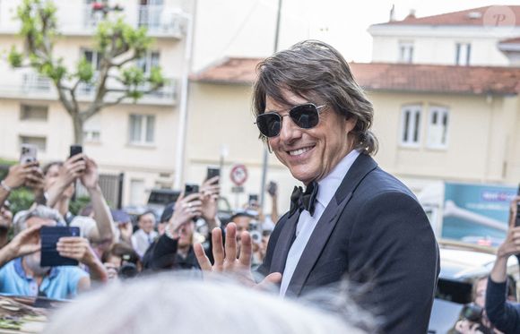 Tom Cruise - Célébrités se rendent sur la montée des marches du film « Mission Impossible : The Final Reckoning » lors du 78ème Festival International du Film de Cannes le 14 mai 2025. © Yehiel Chekroune/Bestimage