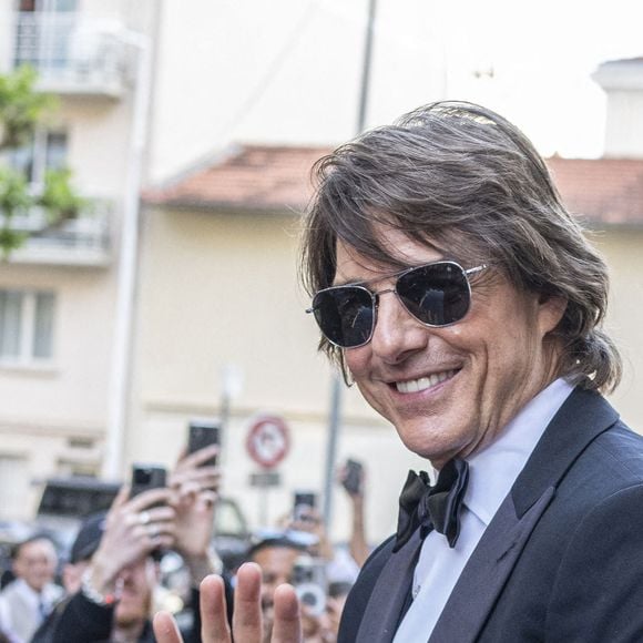Tom Cruise - Célébrités se rendent sur la montée des marches du film « Mission Impossible : The Final Reckoning » lors du 78ème Festival International du Film de Cannes le 14 mai 2025. © Yehiel Chekroune/Bestimage