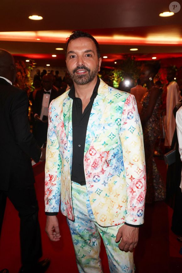 Il est connu comme chorégraphe de la Star Academy et de grandes comédies musicales.

Exclusif -  Kamel Ouali - Dîner de gala organisé par la Fondation "Children of Africa" à l'initiative de Madame D.Ouattara, Première Dame de Côte d'Ivoire et Présidente fondatrice de "Children of Africa" au Sofitel Ivoire à Abidjan. Le 1er Mars 2024
© Dominique Jacovides / Bestimage