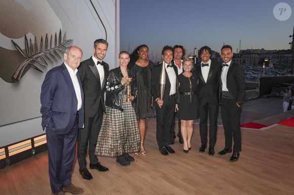 Exclusif - Pierre Lescure, Tony Estanguet, Marie Patouillet et la flamme olympique, Marie-José Perec, Patrick Cohen, Bertrand Chameroy,  Anne-Elisabeth Lemoine, Arnaud Assoumani, Mohamed Bouhafsi - Plateau de l'émission "C à vous" lors du 77ème Festival International du Film de Cannes le 21 mai 2024. © Jack Tribeca/Bestimage  No Web - Belgique et Suisse