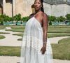 Aya Nakamura portait une longue robe blanche rayée et légèrement transparente.

Aya Nakamura assiste au défilé Jacquemus Menswear Spring/Summer 2026 dans le cadre de la semaine de la mode à Paris, France, le 29 juin 2025. Photo par Aurore Marechal/ABACAPRESS.COM