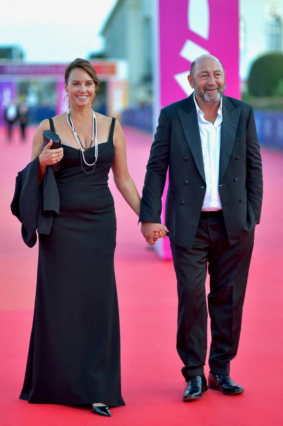 Très discret sur sa vie privée, le couple (ndlr : ils forment une famille recomposée puisqu'elle est maman de Luigi, fruit de ses amours avec un ancien compagnon Julien, tandis que lui est papa de Kalil né de sa relation avec Emmanuelle Cosso) a même caché son mariage pendant un moment.

Julia Vignali et Kad Merad à Nouvelle Vague au 51ème Festival du Film Américain de Deauville le 12 septembre 2025 à Deauville, France @Franck Castel/Abaca