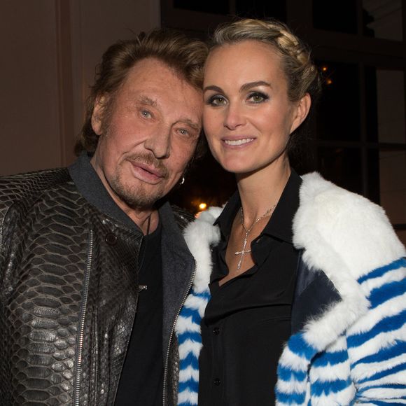 Exclusif - Prix Special - No web - No blog - Johnny Hallyday et sa femme Laeticia - Aftershow apres le concert caritatif de Johnny Hallyday pour l'association de sa femme "La Bonne Etoile", qui vient en aide aux enfants du Vietnam, au Trianon a Paris, le 15 decembre 2013.