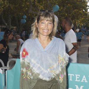 "Je suis à Avignon depuis hier, pour voir des spectacles, voir des amis, explique-t-elle, hilare. Et... Il doit y avoir un truc entre Avignon et moi ! Déjà, l'année dernière, je m'étais pris une saucée du siècle. Et là... Je crois que si j'avais été sous la douche, j'aurais été moins mouillée." 

Mélanie Page - People à la Pétanque Turquoise sur la Place des Lices à Saint-Tropez, au profit de l'association "Soleil d'Enfance". Le 11 août 2024. © Jack Tribeca / Bestimage