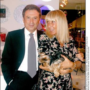 Michel Drucker et son épouse Dany Saval assistent à la soirée organisée par Michel Drucker à l'occasion de la 200e émission de son talk-show Vivement Dimanche", le 18 septembre 2003. © Jean-Jacques Datchary/ABACA