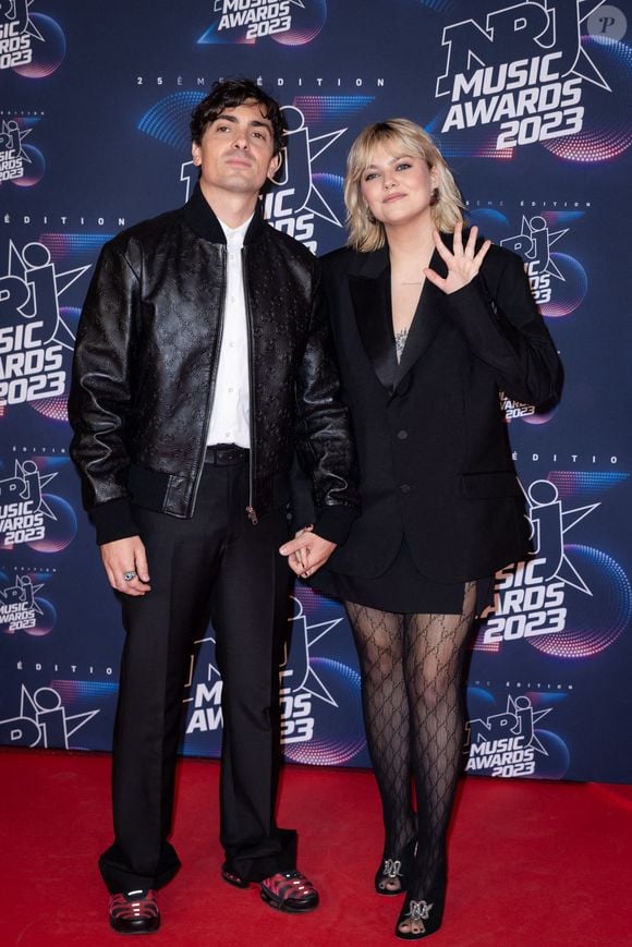 Tapis rouge des NRJ MUSIC AWARDS 2023. LOUANE ET FLORIAN ROSSI assistent au tapis rouge des NRJ MUSIC AWARDS 2023, au Palais des Festivals, à Cannes. Le 10 novembre 2023. Photo by Shootpix/ABACAPRESS.COM