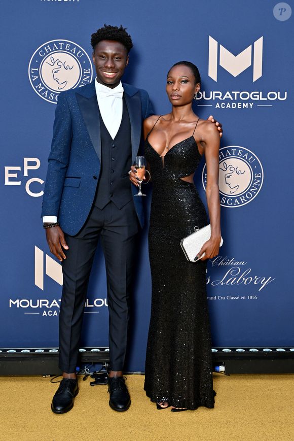 Moïse Kouamé et une amie - 10ème édition du Gala de Charité de Patrick Mouratoglou à l'Académie Mouratoglou à Biot Sophia Antipolis, le 23 juin 2024. © Bruno Bebert/Bestimage