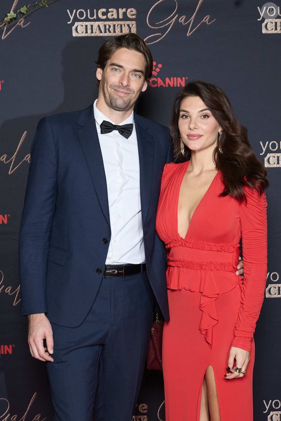 Camille Lacourt et sa compagne Alice Detollenaere - Photocall de la première édition du "You Care Charity Gala" en faveur de la cause animale et de l'environnement au Cercle Interalliée à Paris le 3 décembre 2024.© Cyril Moreau/Bestimage
