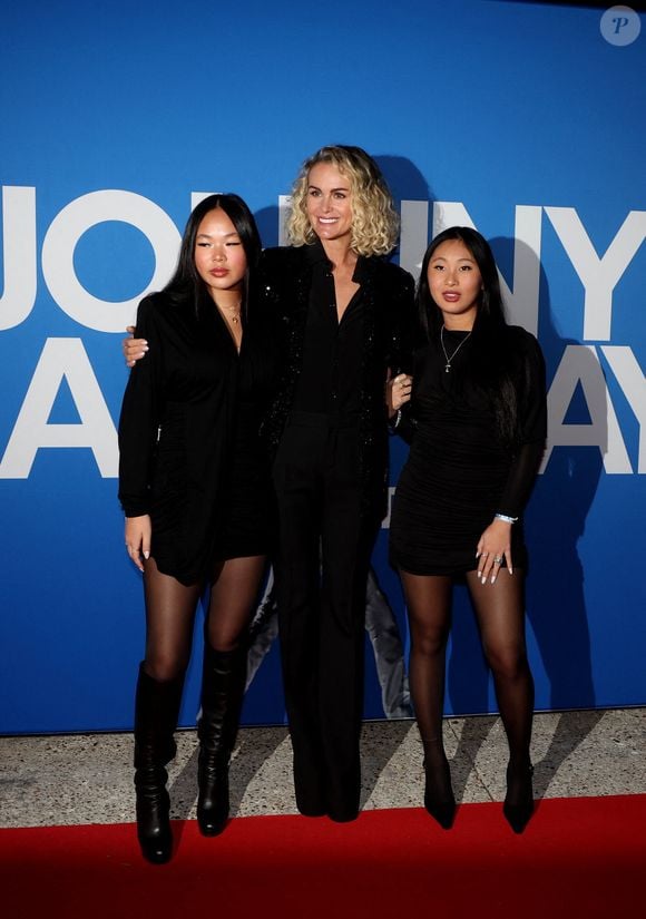 Laeticia Hallyday et ses filles Joy et Jade - Photocall du vernissage de l'exposition "Johnny Hallyday, l'exposition" au Palais des Expositions à Paris. Le 21 décembre 2023
© Dominique Jacovides / Bestimage