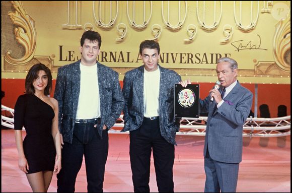 Archives - Le groupe Début de soirée et Guy Lux sur le plateau de l'émission "Interchallenges" en 1988 @AGENCE / BESTIMAGE
