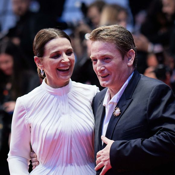 Benoît Magimel et Juliette Binoche - Descente des marches du film " La passion de Dodin Bouffant " lors du 76ème Festival International du Film de Cannes, au Palais des Festivals à Cannes. Le 24 mai 2023
© Jacovides-Moreau / Bestimage