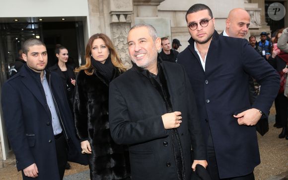 Le styliste Elie Saab, sa femme Claudine et son fils Elie Saab Jr sortant du défilé de mode "Elie Saab", collection prêt-à-porter Automne/Hiver 2017-2018 au Grand Palais à Paris, le 4 mars 2017.© CVS/Veeren/Bestimage