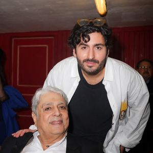 Exclusif - Enrico Macias et Symon, son petit fils lors du concert anniversaire (85 ans) du chanteur sur la scène du théâtre Dejazet à Paris le 11 décembre 2023. © Jack Tribeca / Bestimage