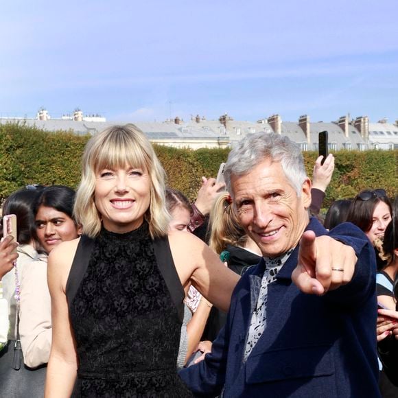 Nagui et Mélanie Page au défilé Christian Dior Collection Femme Prêt-à-Porter Printemps/Eté 2026 lors de la Fashion Week de Paris (PFW), dans le Jardin des Tuileries, à Paris, le 1er octobre 2025. 

© Christophe Aubert via Bestimage