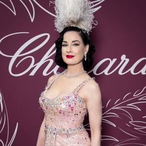 Plusieurs célébrités étaient présentes, dont Bella Hadid, Demi Moore, Adriana Lima et Carla Bruni.
Dita von Teese - Photocall de la soirée " Chopard Miracle Gala Evening " lors du 79ème Festival International du Film de Cannes. Le 18 mai 2026
© Olivier Borde / Bestimage