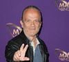 Depuis 2005, il se produit régulièrement sur scène sous le pseudonyme de "Dédé le Rockcœur".

André Bouchet - Photocall officiel, organisé par TF1 et Musée Grévin, de la soirée "Watch Party" de lancement de la nouvelle saison de "Mask Singer" au Musée Grévin à Paris le 24 avril 2026.

© Guirec Coadic / Bestimage