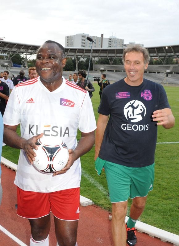 Basile Boli et Laurent Blanc - Match pour Thierry Roland et pour les 80 ans du football professionnel. Match de Gala, opposant le Varietes Club de France à la selection republicaine au Stade Charlety a Paris le 12 Septembre 2012.