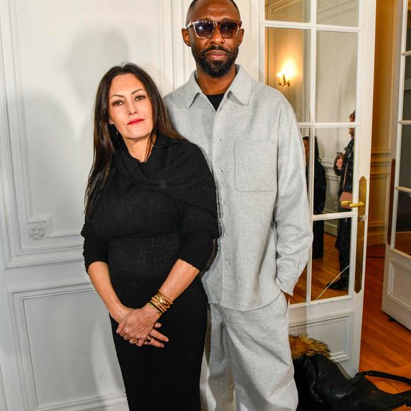 Thomas Ngijol et Karole Rocher assistent au défilé Imane Ayissi Haute Couture Printemps/Été 2024 dans le cadre de la semaine de la mode à Paris le 22 janvier 2024 à Paris, France. Photo by Shootpix/ABACAPRESS.COM