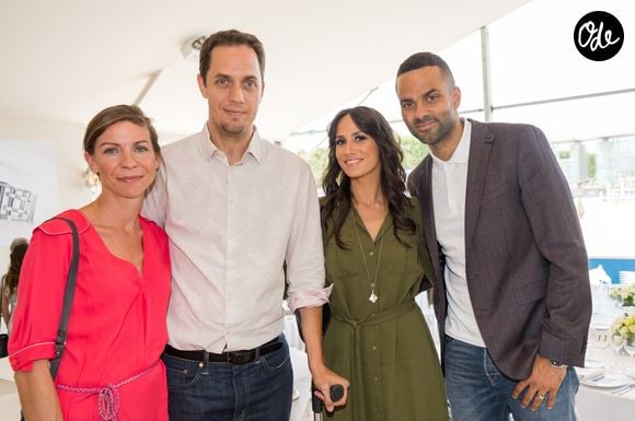 De cette expatriation, elle a aussi puisé un nouveau souffle. A son retour, elle a initié un changement sur son CV en devenant Directrice clients pour Transdev. 

Grand Corps malade et sa femme Julia Marsaud avec Tony Parker et sa femme Axelle Francine lors du Longines Paris Eiffel Jumping au Champ-de-Mars à Paris, le 5 juillet 2015. Crédit Veeren / Bestimage