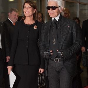 Le créateur Karl Lagerfeld et la princesse Caroline de Monaco arrivent à la cérémonie du 'Menschen in Europa Charity Award' ('Personnes en Europe') au Media Centre Passau, à Passau, en Allemagne, le 12 décembre 2011. La princesse est récompensée pour son engagement dans l'organisation caritative Amade Mondiale pour ses enfants. Photo Armin Weigel/DPA/ABACAPRESS.COM