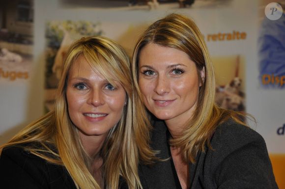 Mais les animatrices restent touchées par la fin de C8.

Elodie Ageron et Sandrine Arcizet lors du Noël de la fondation Assistance aux anomaux, à Paris, au parc des expositions, Porte de Versailles, le 19 novembre 2011.