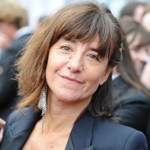 Très émue, la comédienne a exprimé sa déception et sa gratitude envers les spectateurs venus nombreux.

Exclusif - Romane Bohringer - Arrivée des people avant la montée des marches du film "La belle époque" lors du 72ème Festival International du Film de Cannes, le 19 mai 2019.