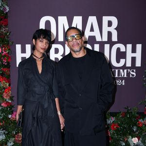 JoeyStarr (Joey Starr) et sa compagne Pauline Latchoumanin au photocall de la soirée Omar Harfouch "Dîner chez Maxim's" à Paris le 9 octobre 2024. © Rachid Bellak / Bestimage