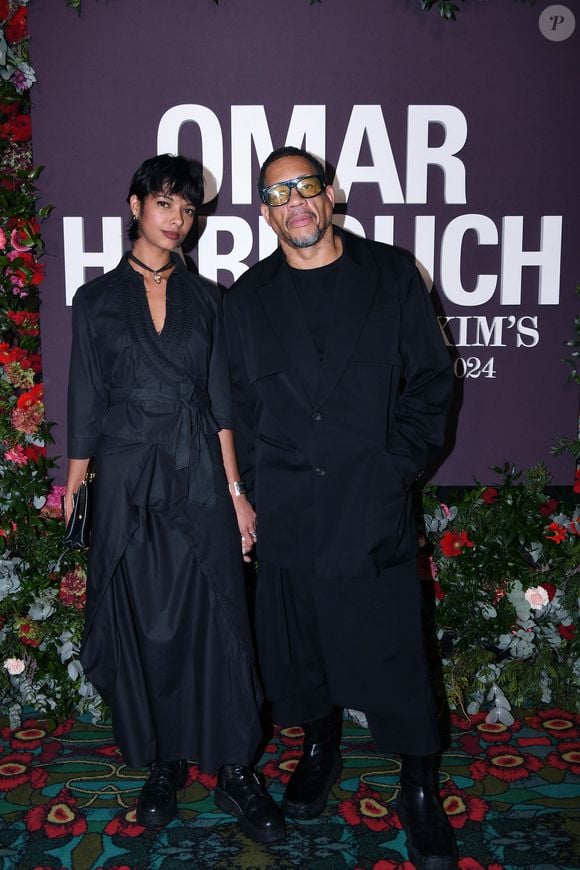 JoeyStarr (Joey Starr) et sa compagne Pauline Latchoumanin au photocall de la soirée Omar Harfouch "Dîner chez Maxim's" à Paris le 9 octobre 2024. © Rachid Bellak / Bestimage