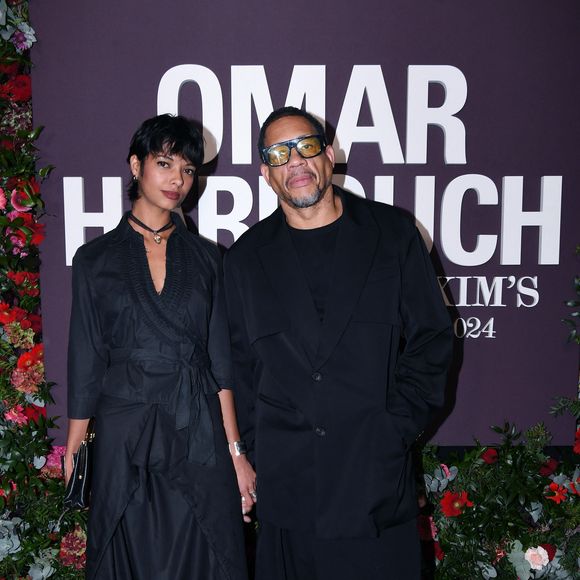 JoeyStarr (Joey Starr) et sa compagne Pauline Latchoumanin au photocall de la soirée Omar Harfouch "Dîner chez Maxim's" à Paris le 9 octobre 2024. © Rachid Bellak / Bestimage