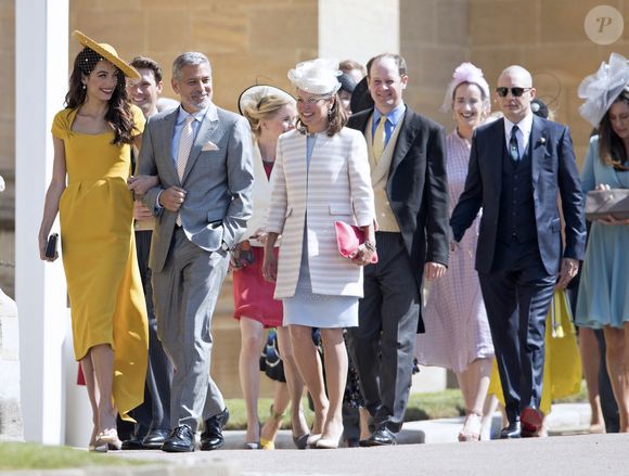 George Clooney et sa femme Amal Alamuddin Clooney, Tom Hardy - Les invités à la sortie de la chapelle St. George au château de Windsor, Royaume Uni, le 19 mai 2018.