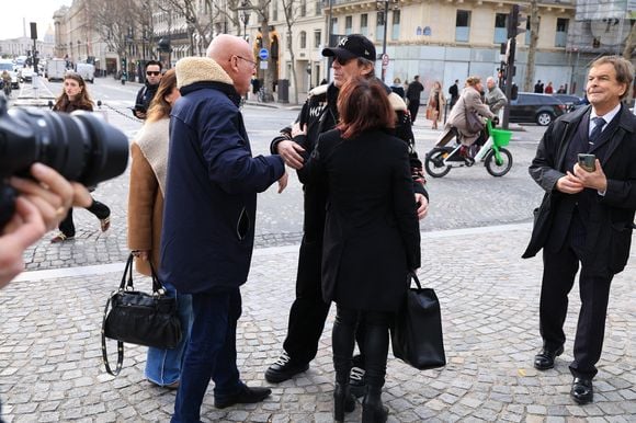 Bernard Laporte, Jean-Luc Reichmann arrivant à la cérémonie d'enterrement de Rolland Courbis à l'église de la Madeleine à Paris, France, le 14 janvier 2026. Rolland Courbis, ancien footballeur français, entraîneur et commentateur médiatique au franc-parler, est décédé à l'âge de 72 ans. Photo par Jerome Domine/ABACAPRESS.COM