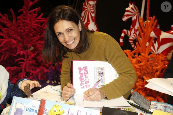 Adeline Blondieau dédicace ses livres dont le dernier "Le yoga des enfants" au marché de Noël de la Défense le 14 Décembre 2019
© Christophe Aubert via Bestimage