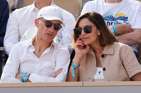 Gilles Bouleau et Nadia Farès en tribunes lors des Internationaux de France de tennis de Roland Garros 2023, à Paris, France, le 9 juin 2023. © Jacovides-Moreau/Bestimage