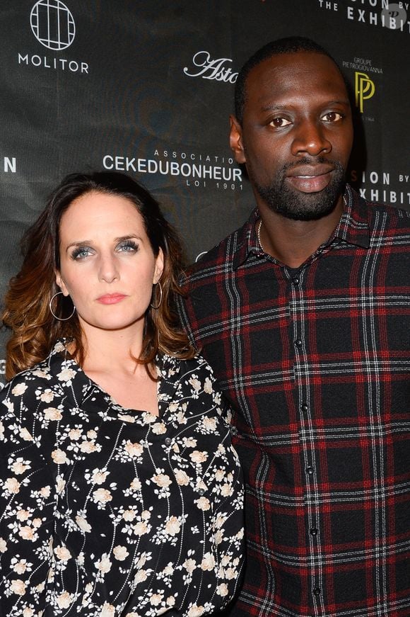 Omar Sy et sa femme Hélène au vernissage de l'exposition "Vision by AG", au profit de l'association caritative CeKeDuBonheur, à la Piscine Molitor à Paris, le 30 novembre 2016.
© Guirec Coadic/Bestimage