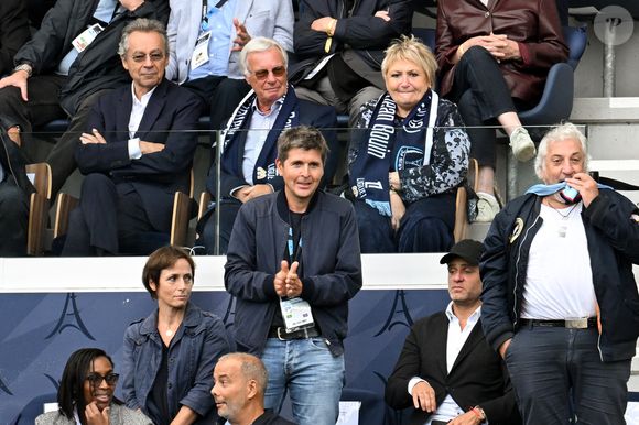 Michel Denisot, Thomas Sotto - Célébrités lors du match de football de Ligue 1 McDonald's entre le Paris FC contre Metz (3-2) au stade Jean Bouin à Paris le 31 aout 2025. © Lionel Urman/Bestimage