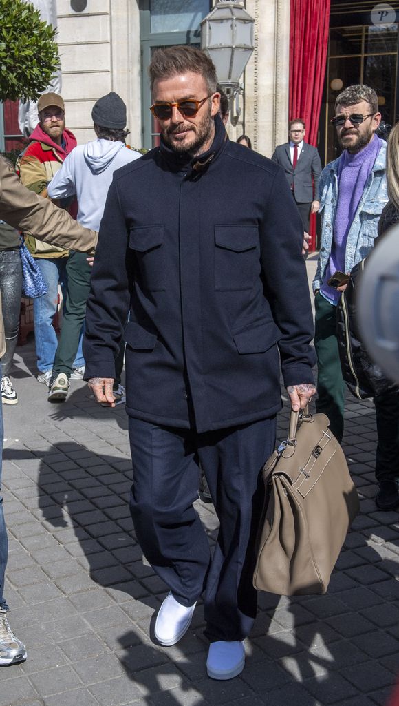 David Beckham - Les Beckham quittent leur hôtel La Réserve, à Paris, le 8 mars 2025.  GOFF INF / BESTIMAGE